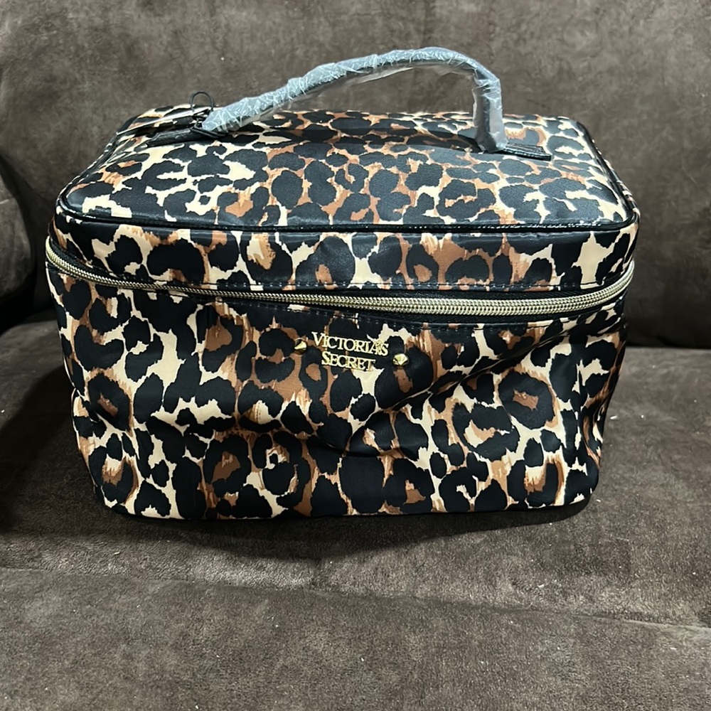 Victoria Secrets cheetah print make up bag set